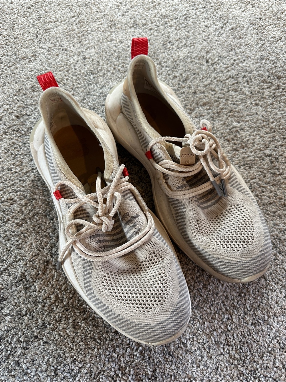 Sorel Knit Slip-On Sneakers in Cream with Red Pull Tabs
